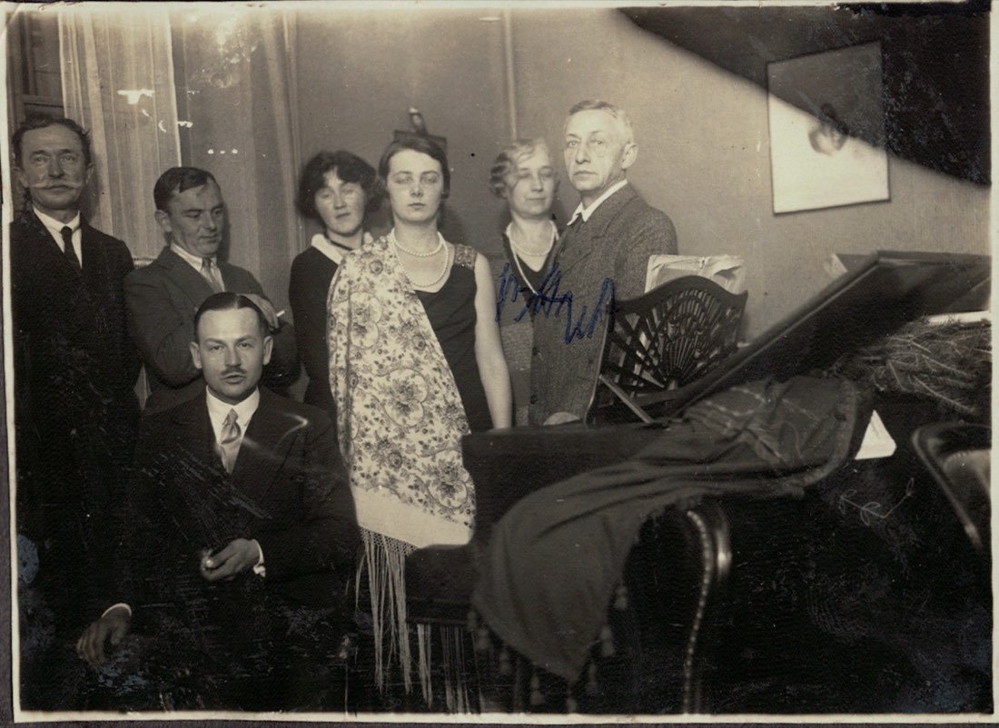 A musical evening with Ivan Bunin standing at right, the photograph autographed
