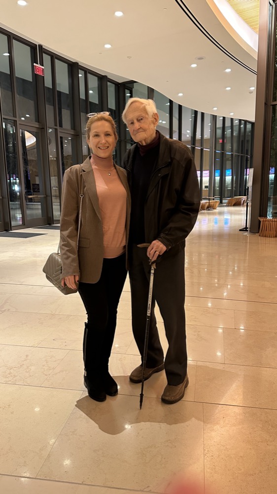 Alexander Kugushev with Liza Bakunina at an evening event